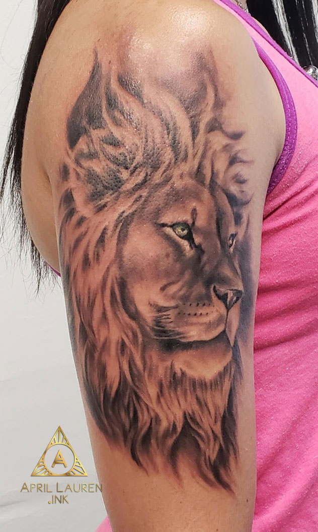 Peaceful Lion Portrait Tattoo