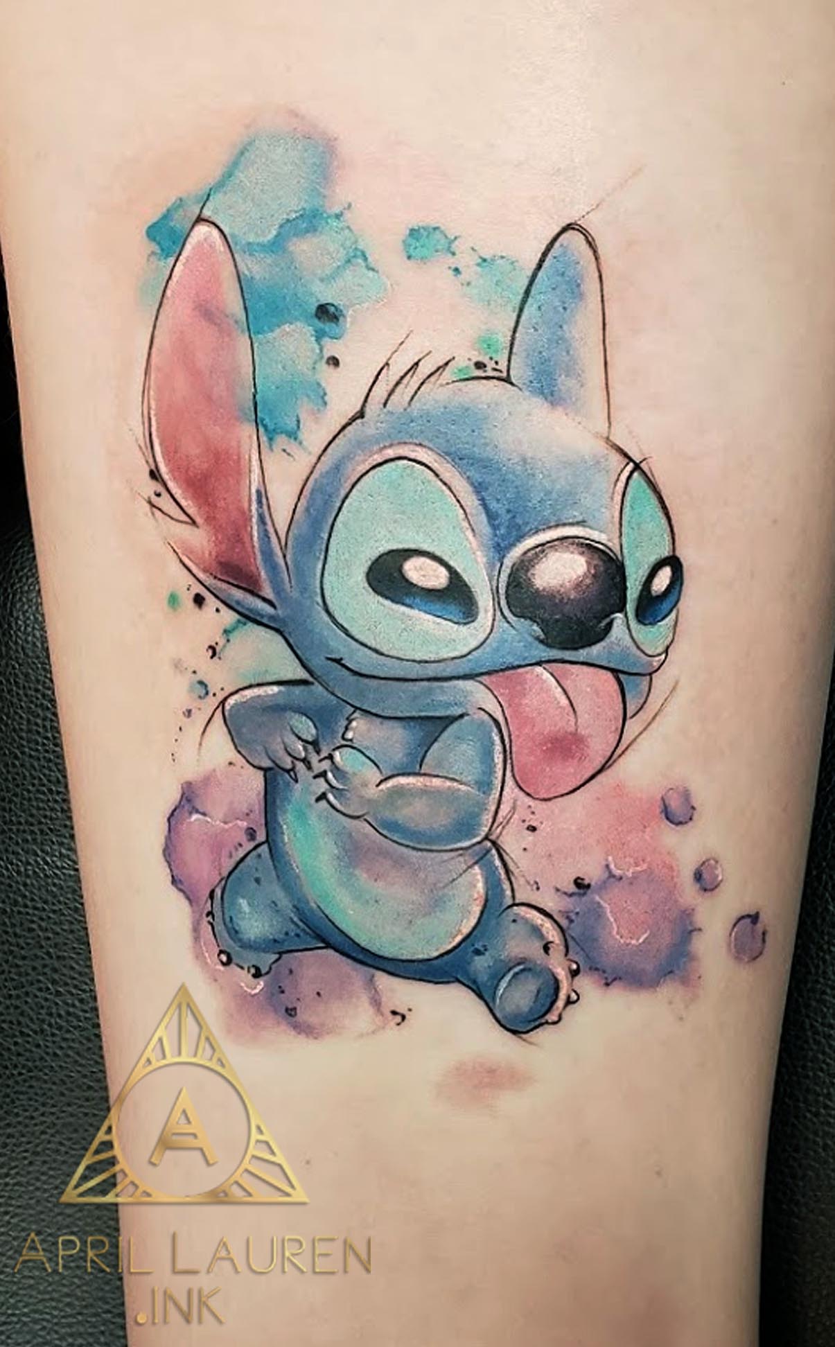 Watercolor Stitch Tattoo on thigh