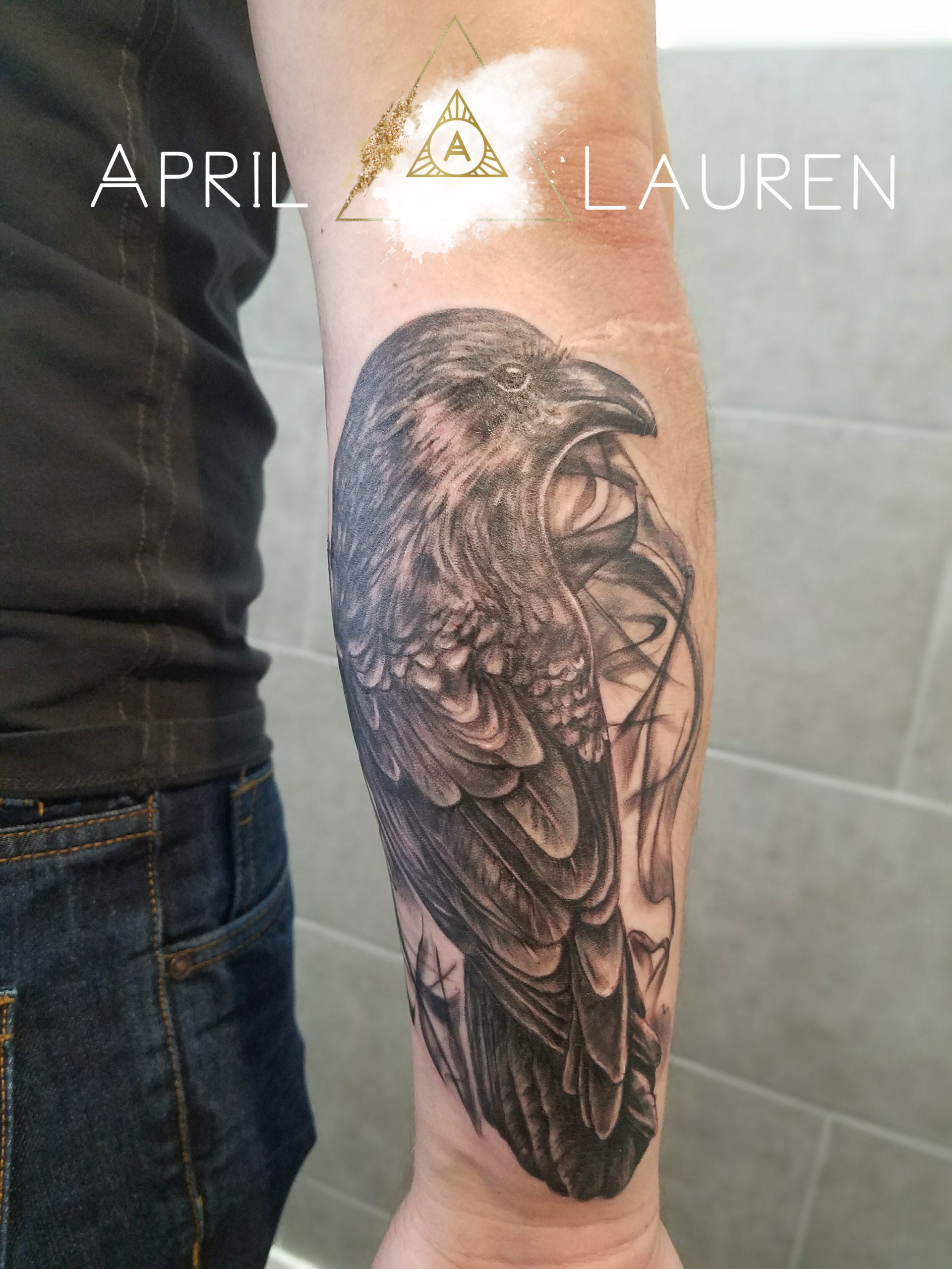 black and grey bird crow tattoo with smoke by April Lauren at Naya Studio