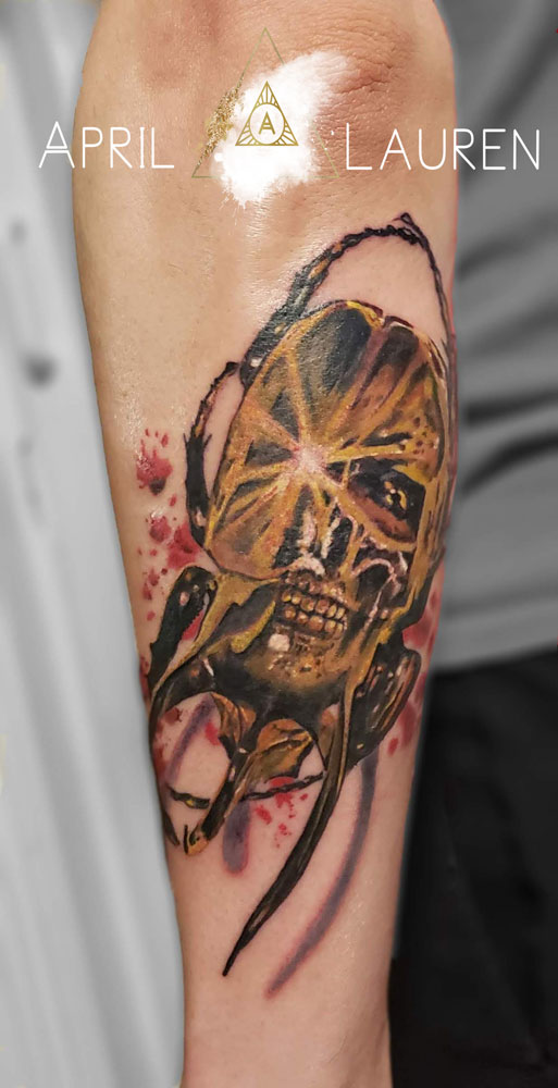 syfy monster tattoo with blood splatter tattoo by April Lauren at Naya Studio
