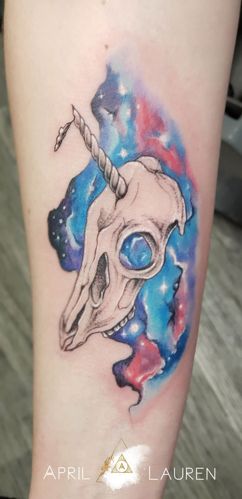 skull Unicorn water color space background tattoo by April Lauren at Naya Studio